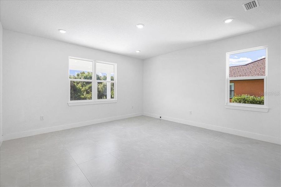 Spacious, unfurnished interior of a new home in , Port Charlotte (Image 22).