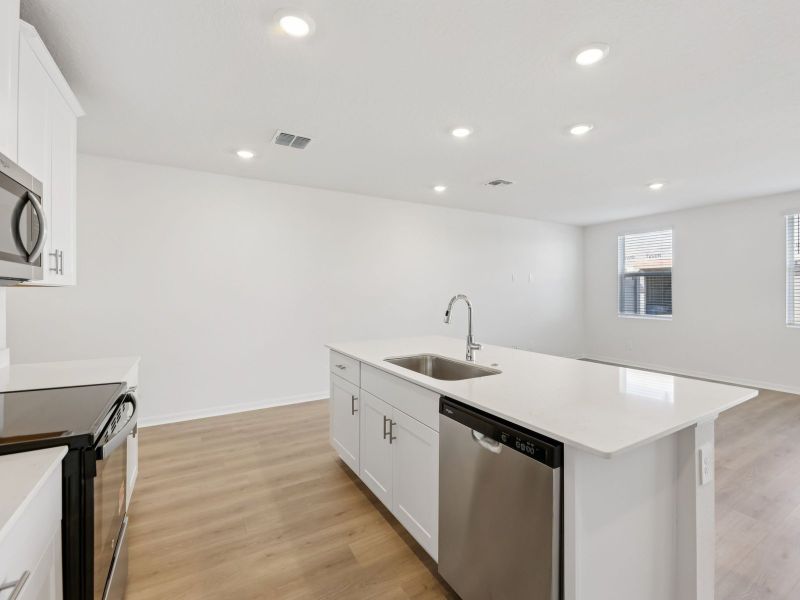 Furnished interior view inside a new home in The Meadow at Crossprairie Townes, St. Cloud (Image 6). Furnished interior view inside a new home in The Meadow at Crossprairie Townes, St. Cloud (Image 6).