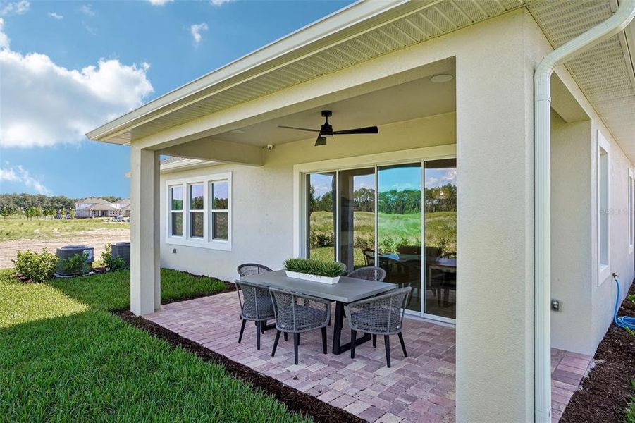 Exterior details and patio area of a home in Northlake at Ovation, Winter Garden (Image 2).