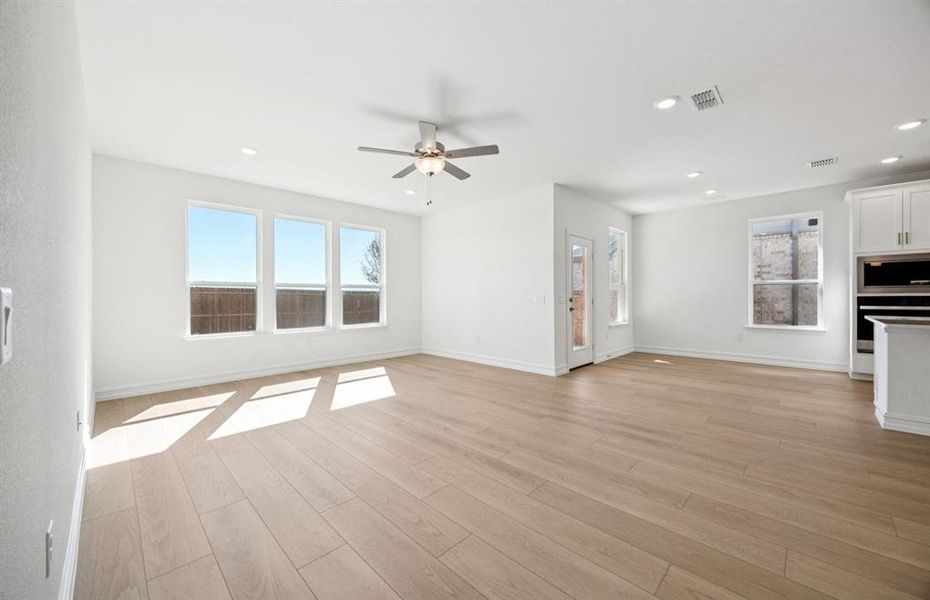 Bright and open gathering space with an adjoining nook Bright and open gathering space with an adjoining nook