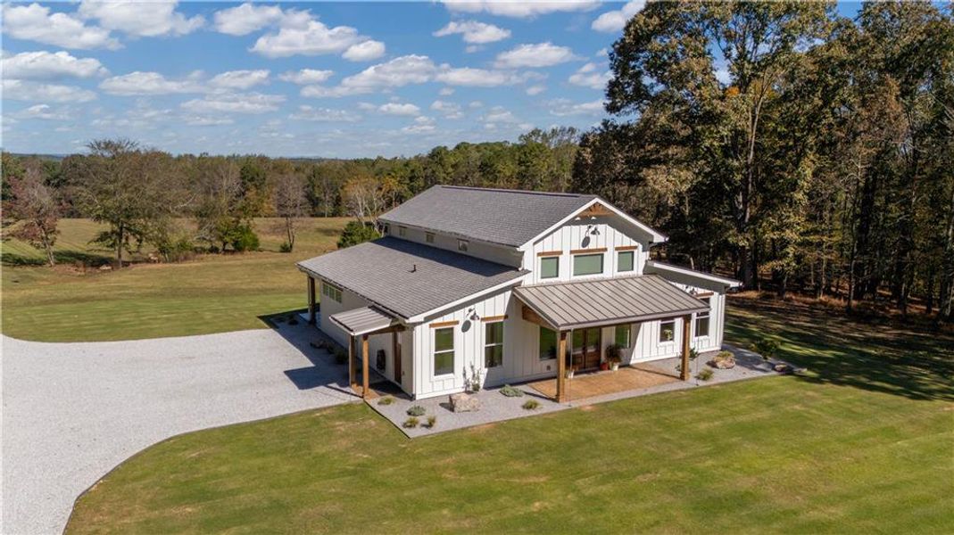 Front exterior of a new home in , Maysville, GA, highlighting curb appeal (Image 2). Front exterior of a new home in , Maysville, GA, highlighting curb appeal (Image 2).