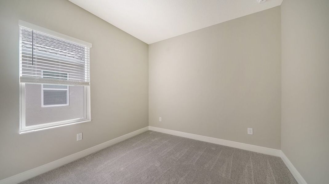 Spacious, unfurnished interior of a new home in Windward, Sarasota (Image 28).