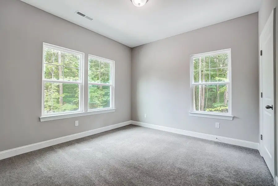 Representative unfurnished interior of a home built from the Badin by Caruso Homes in Blue Run, Raleigh (Image 46). Representative unfurnished interior of a home built from the Badin by Caruso Homes in Blue Run, Raleigh (Image 46).