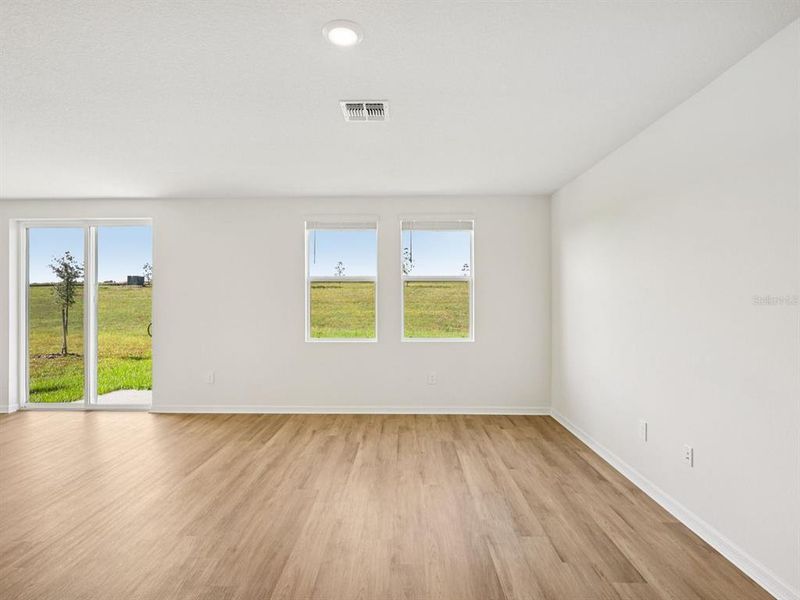 Spacious, unfurnished interior of a new home in The Reserve at Van Oaks, Auburndale (Image 12).