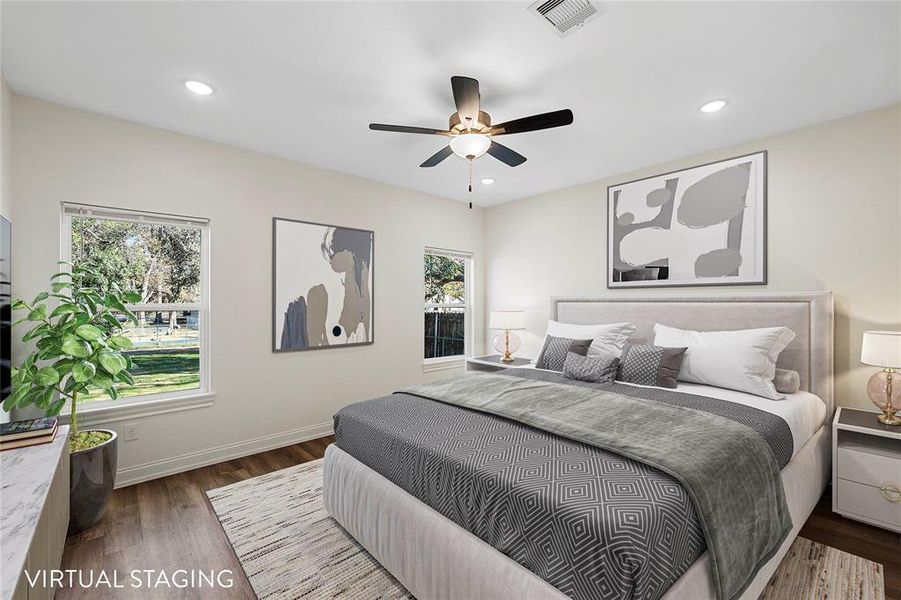 Bedroom featuring dark wood finished floors, recessed lighting, and ceiling fan Bedroom featuring dark wood finished floors, recessed lighting, and ceiling fan