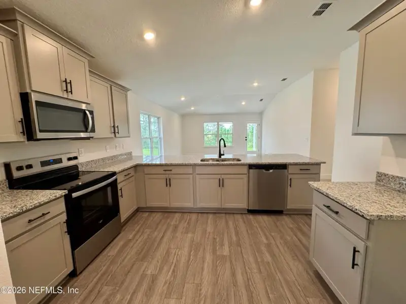 Furnished interior view inside a new home in Shadow Crest at Rolling Hills, Green Cove Springs (Image 5).