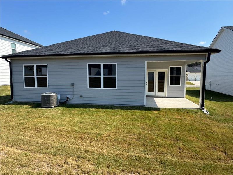 Exterior details and patio area of a home in Oakchase at Hampton, Hampton (Image 18).