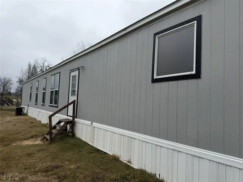 Exterior details and patio area of a home in , Murchison (Image 2). Exterior details and patio area of a home in , Murchison (Image 2).