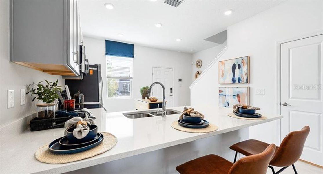 Furnished interior view inside a new home in The Townhomes at Westview, Kissimmee (Image 16).