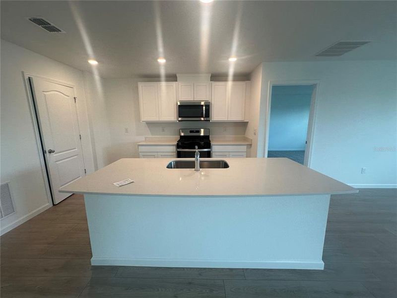 Furnished interior view inside a new home in Entrada, St. Augustine (Image 36).