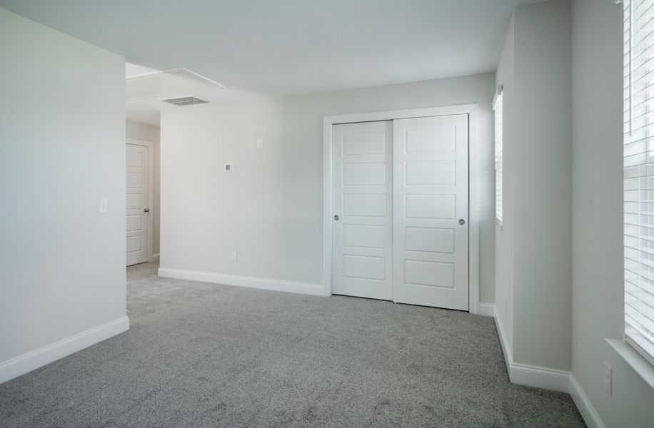 Representative unfurnished interior of a home built from the The Calle by Cothran Homes in Holly Ridge, Greenville (Image 33). Representative unfurnished interior of a home built from the The Calle by Cothran Homes in Holly Ridge, Greenville (Image 33).