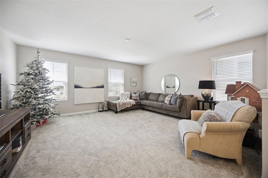 Furnished interior view inside a new home in Seasons at The Grove, Mascotte (Image 15).