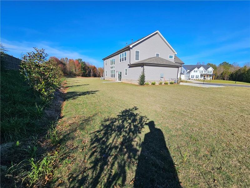 Front exterior of a new home in Conner Farm, Dawsonville, GA, highlighting curb appeal (Image 2).