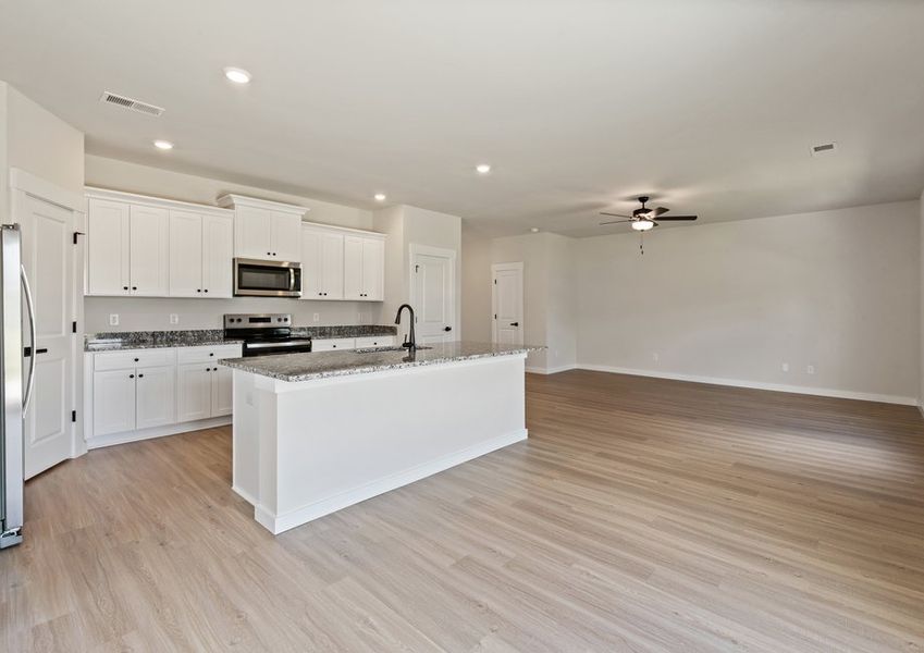 The kitchen has granite countertops