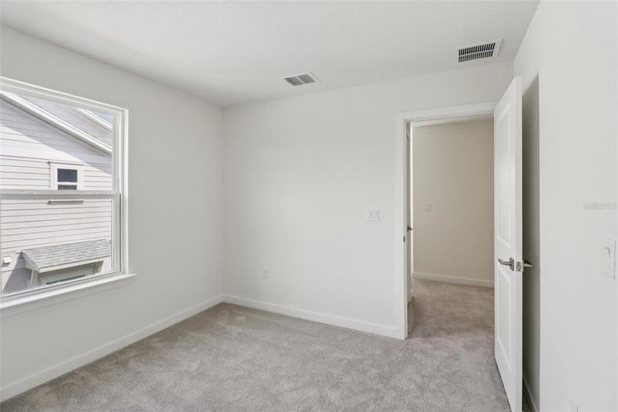 Spacious, unfurnished interior of a new home in Cyrene at Harmony, St. Cloud (Image 17).