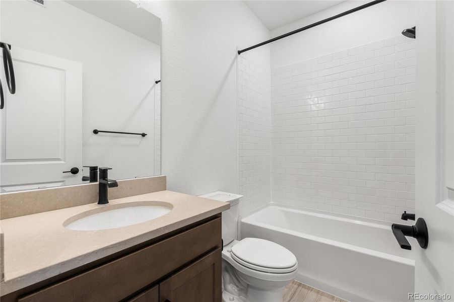 Furnished interior view inside a new home in Harvest Crossing, Aurora (Image 9).