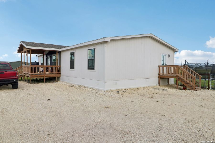 Exterior details and patio area of a home in , Jourdanton (Image 28).