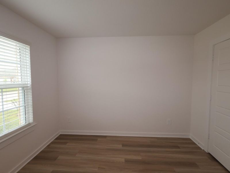 Spacious, unfurnished interior of a new home in Pinewood at Grand Texas, New Caney (Image 20).