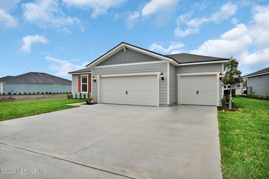 Front exterior of a new home in Hyland Trail, Green Cove Springs, FL, highlighting curb appeal (Image 23). Front exterior of a new home in Hyland Trail, Green Cove Springs, FL, highlighting curb appeal (Image 23).