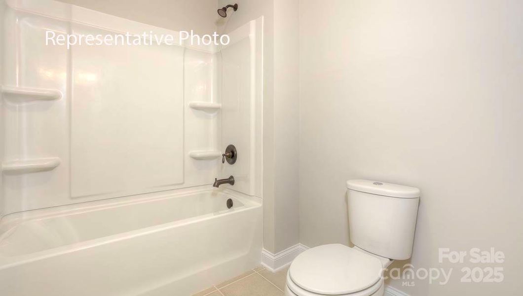 Furnished interior view inside a new home in Sanctuary at Southgate, Indian Trail (Image 9).