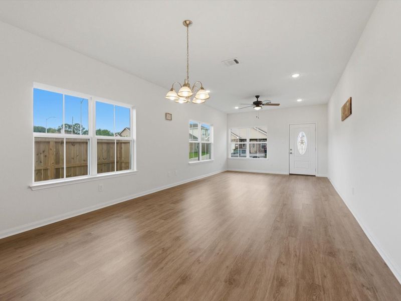 Perfectly positioned for everyday meals and entertaining, the dining area offers an inviting space to gather and connect.