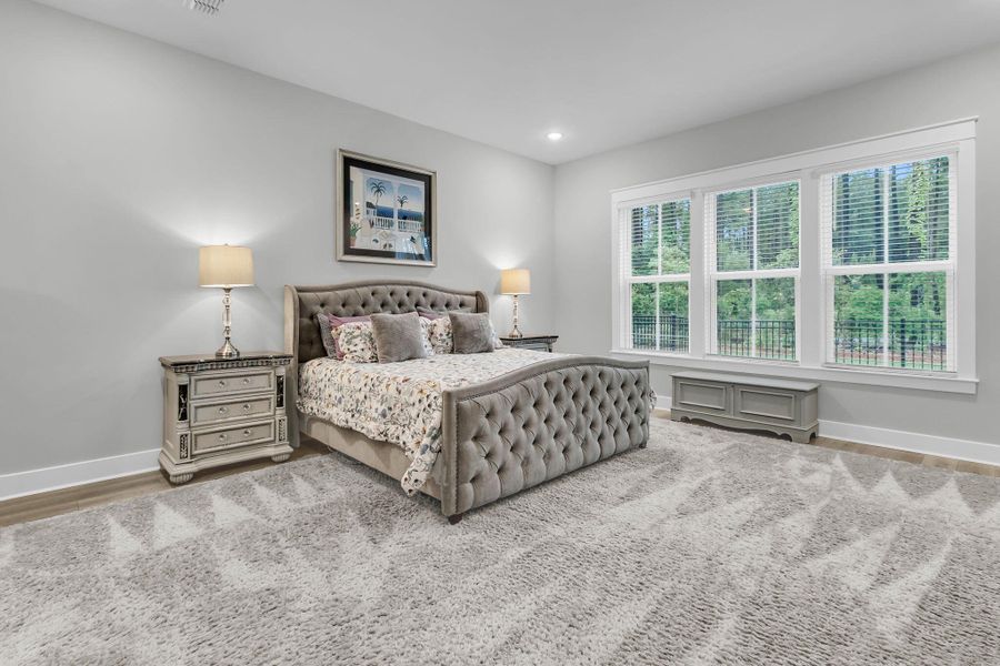 Furnished interior view inside a new home in K. Hovnanian's® Four Seasons at Lakes of Cane Bay, Summerville (Image 18).