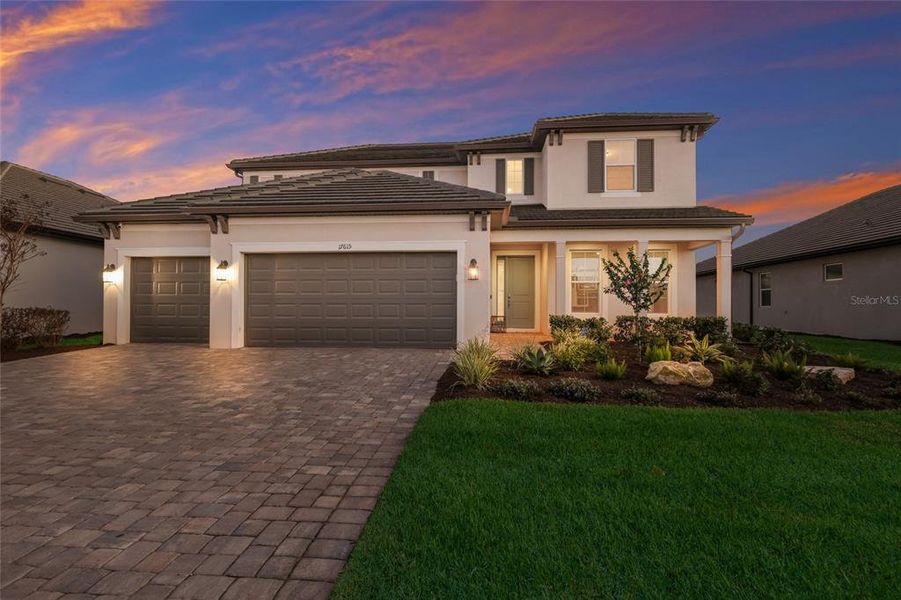 Front exterior of a new home in , Bradenton, FL, highlighting curb appeal (Image 20).