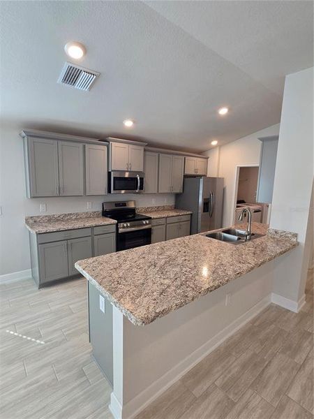 Furnished interior view inside a new home in Wyld Palms, Inverness (Image 6).