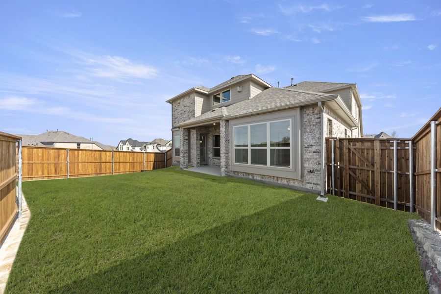 Exterior details and patio area of a home in Providence Cove, McKinney (Image 21). Exterior details and patio area of a home in Providence Cove, McKinney (Image 21).