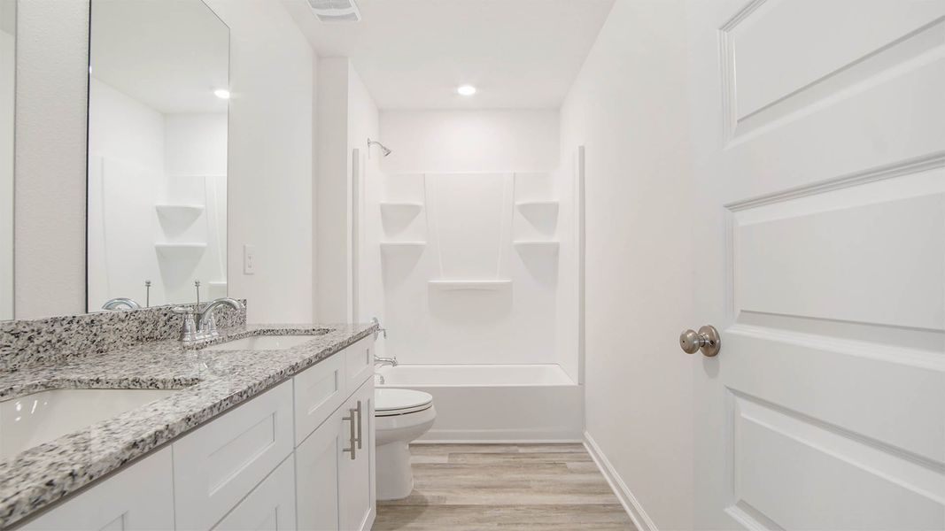 Representative furnished interior of a home built from the Robie by D.R. Horton in Riverwalk, Freeport (Image 33).