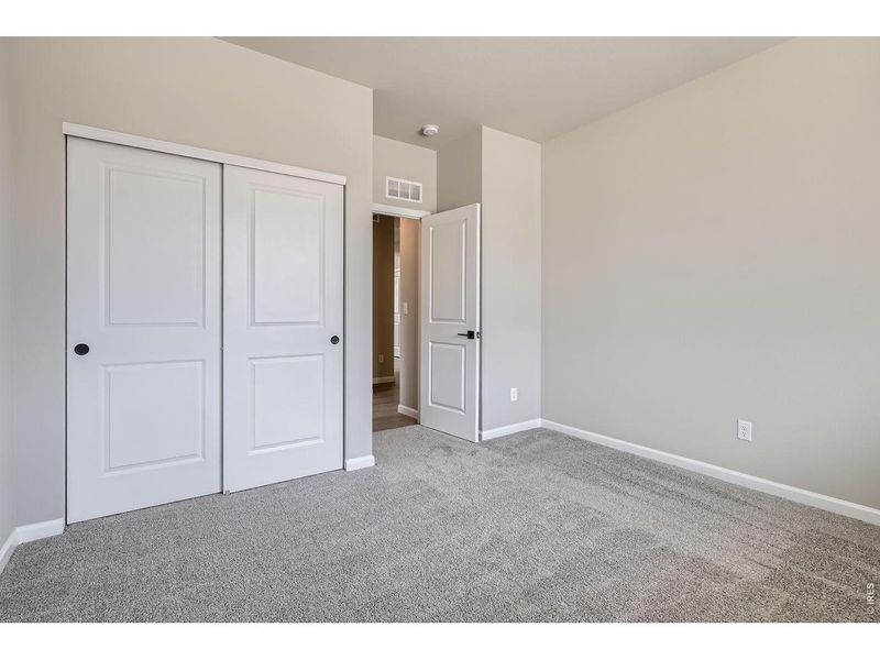 Spacious, unfurnished interior of a new home in Farmstead, Berthoud (Image 44).