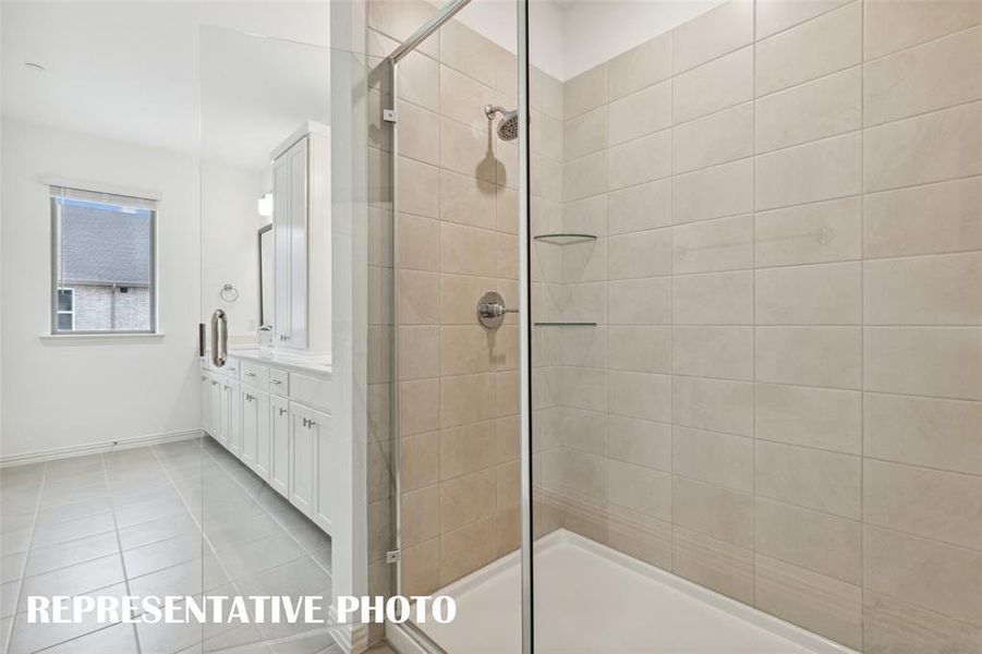 Your new owner's bath comes complete with an oversized, walk in shower.  REPRESENTATIVE PHOTO