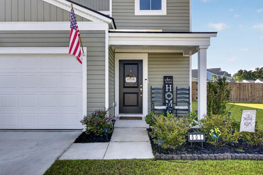 Exterior details and patio area of a home in Lindera Preserve at Cane Bay Plantation, Summerville (Image 4).