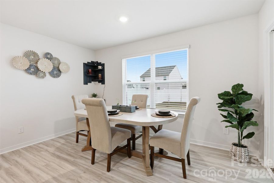 eat in dining area off kitchen, access to screened-in porch