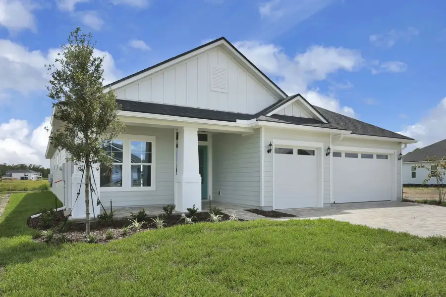 Representative exterior photo of a completed home built from the Tomoka by Riverside Homes in Sagebrush at EverRange, Jacksonville, FL (Image 30).