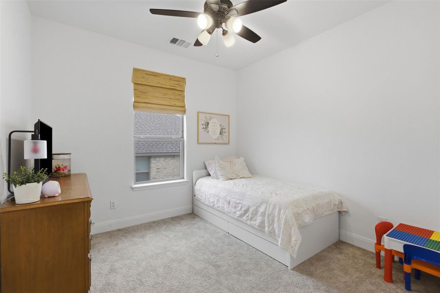 Furnished interior view inside a new home in Wolf Ranch, Georgetown (Image 27).