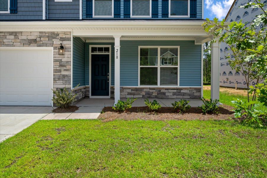 Exterior details and patio area of a home in Parker's Preserve, Ridgeville (Image 3).