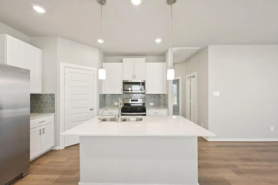 Photo is not of the actual home, but is an inspirational photo of builder’s model home and may depict options, furnishings, and/or decorator features that are not included