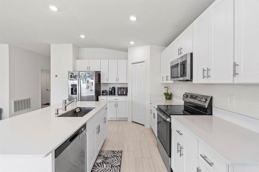 Furnished interior view inside a new home in North Park Isle: The Estates II, Plant City (Image 18). Furnished interior view inside a new home in North Park Isle: The Estates II, Plant City (Image 18).