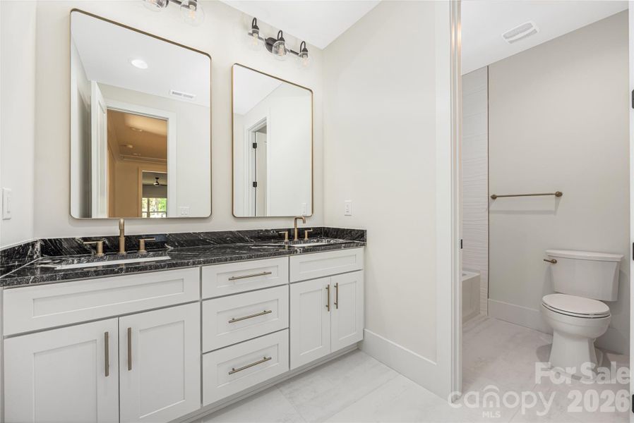 Shared upper level bath.