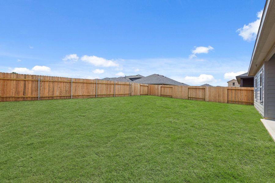 Exterior details and patio area of a home in Grand Pines, Magnolia (Image 3).
