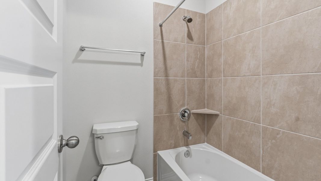 Furnished interior view inside a new home in The Woodlands Hills, Willis (Image 28).