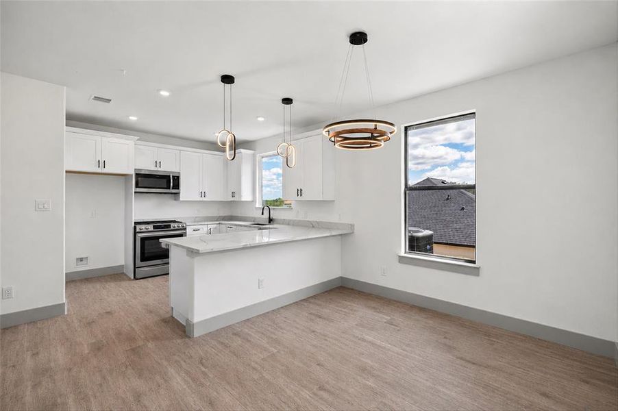 Furnished interior view inside a new home in , Granbury (Image 9).