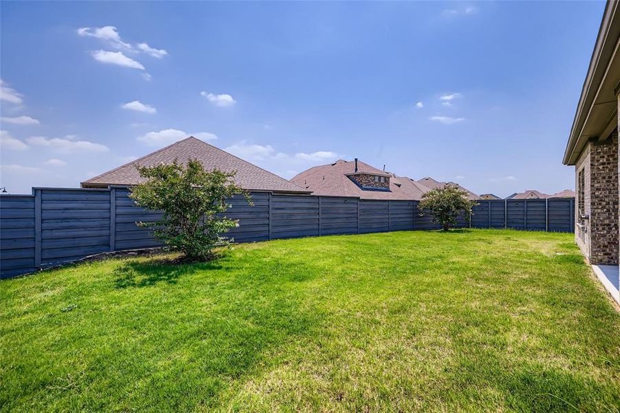 Front exterior of a new home in , Little Elm, TX, highlighting curb appeal (Image 25).