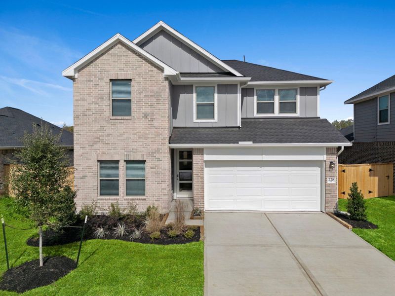 Front exterior of a new home in Laurel Landing, Alvin, TX, highlighting curb appeal (Image 20). Front exterior of a new home in Laurel Landing, Alvin, TX, highlighting curb appeal (Image 20).