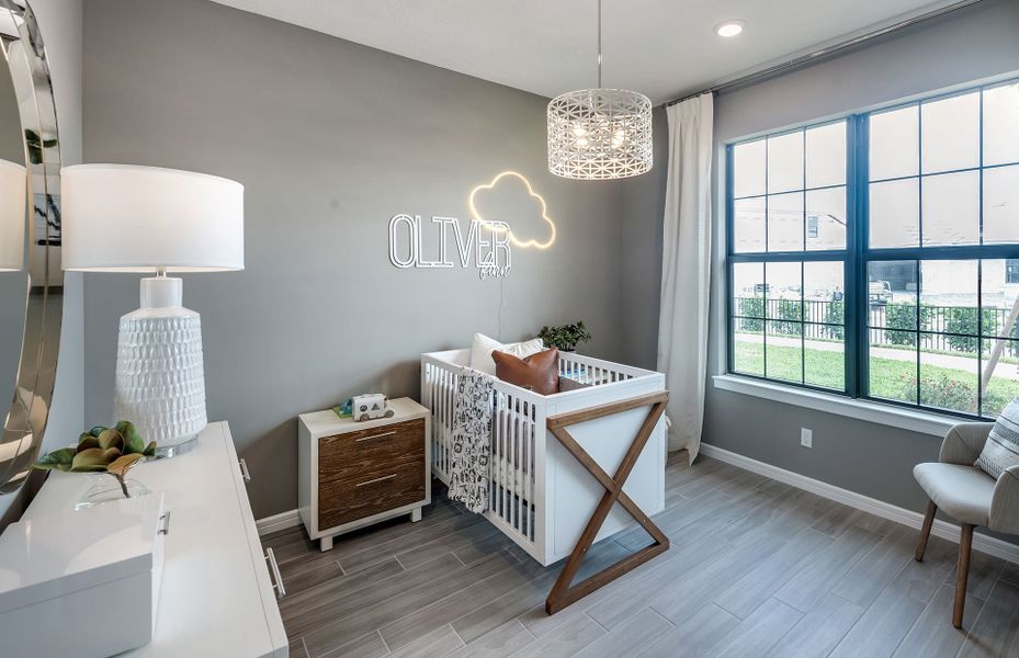 Furnished interior view inside a new home in Cedar Grove at The Woodlands, North Port (Image 9).