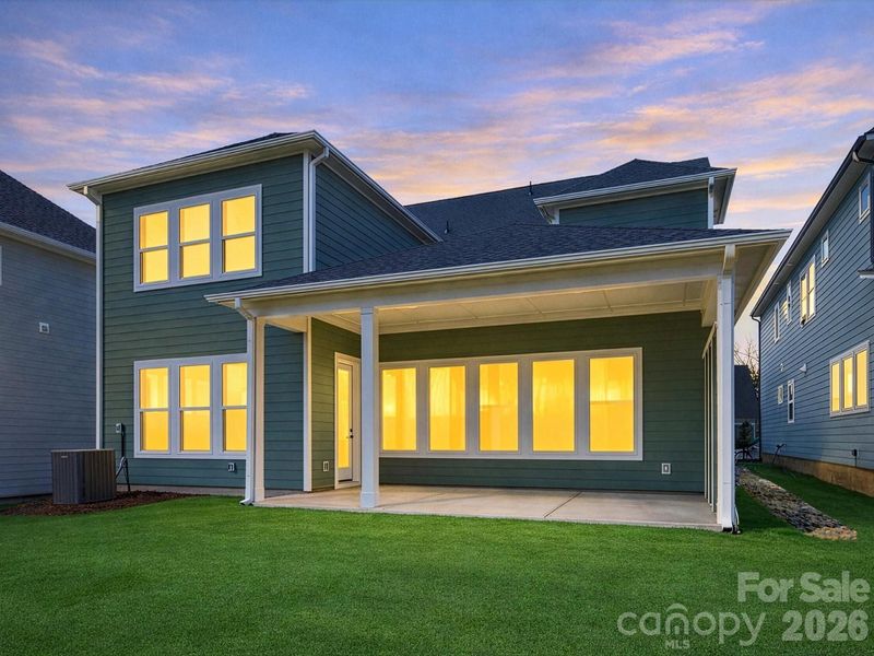 Exterior details and patio area of a home in North Creek Village, Huntersville (Image 4).