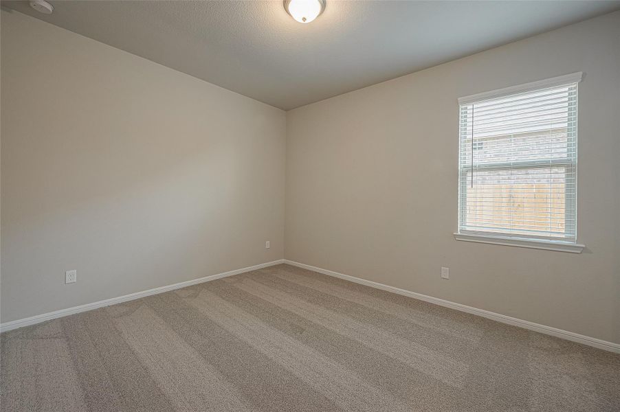 Spacious, unfurnished interior of a new home in , Iowa Colony (Image 25).