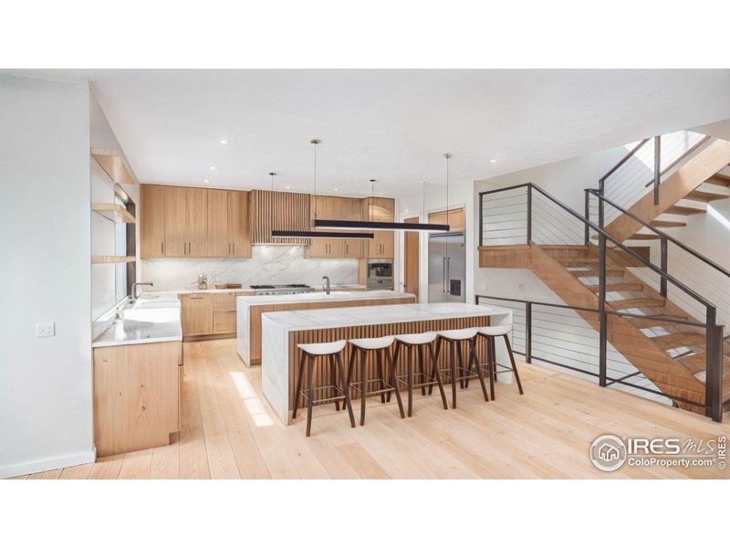 Chefs kitchen - White Oak and Walnut cabinets. Wolf / Sub Zero appliances. Double island and walk-in pantry