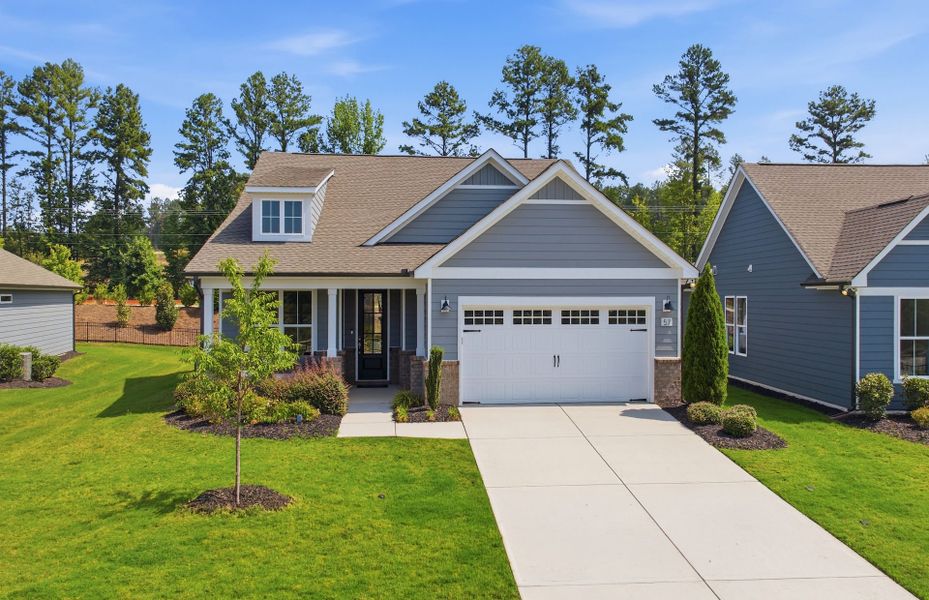 Representative exterior photo of a completed home built from the Mainstay by Del Webb in Del Webb at Chatham Park, Pittsboro, NC (Image 2). Representative exterior photo of a completed home built from the Mainstay by Del Webb in Del Webb at Chatham Park, Pittsboro, NC (Image 2).